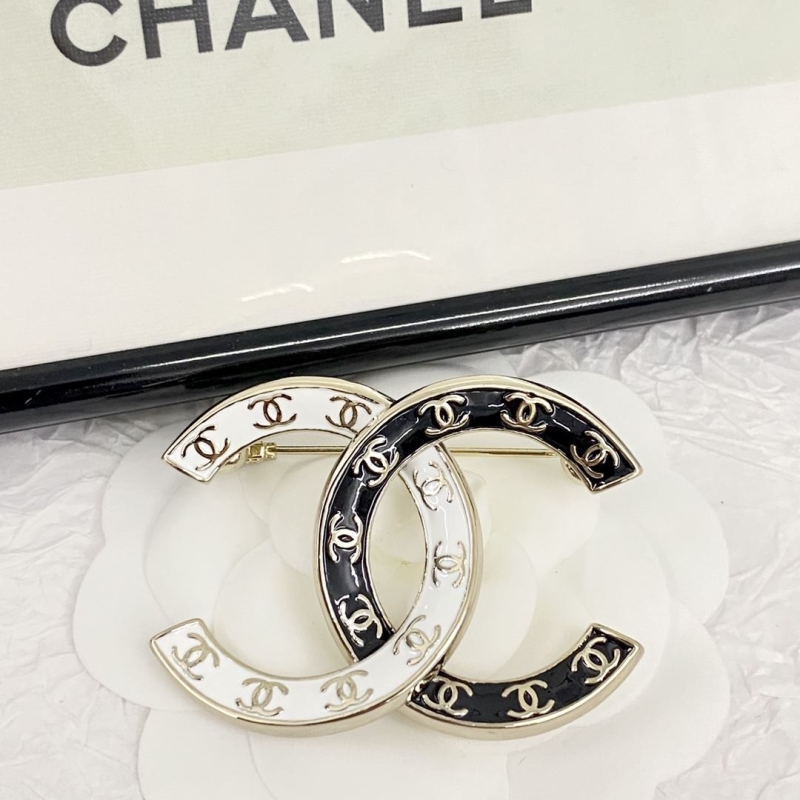 Ch*el brooches